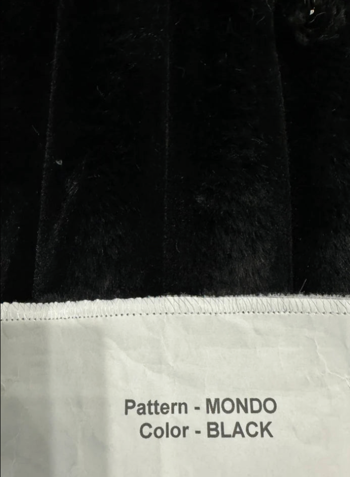 Black fabric swatch with text indicating pattern 'MONDO' and color 'BLACK'.