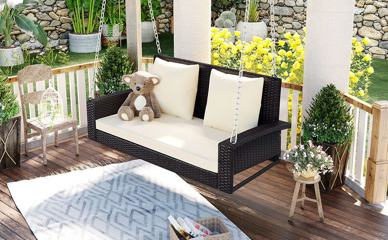 Go 2 Person Wicker Hanging Porch Swing With Chains, Cushion, Pillow, Rattan Swing Bench For Garden, Backyard, Pond. (Brown Wicker, Beige Cushion)