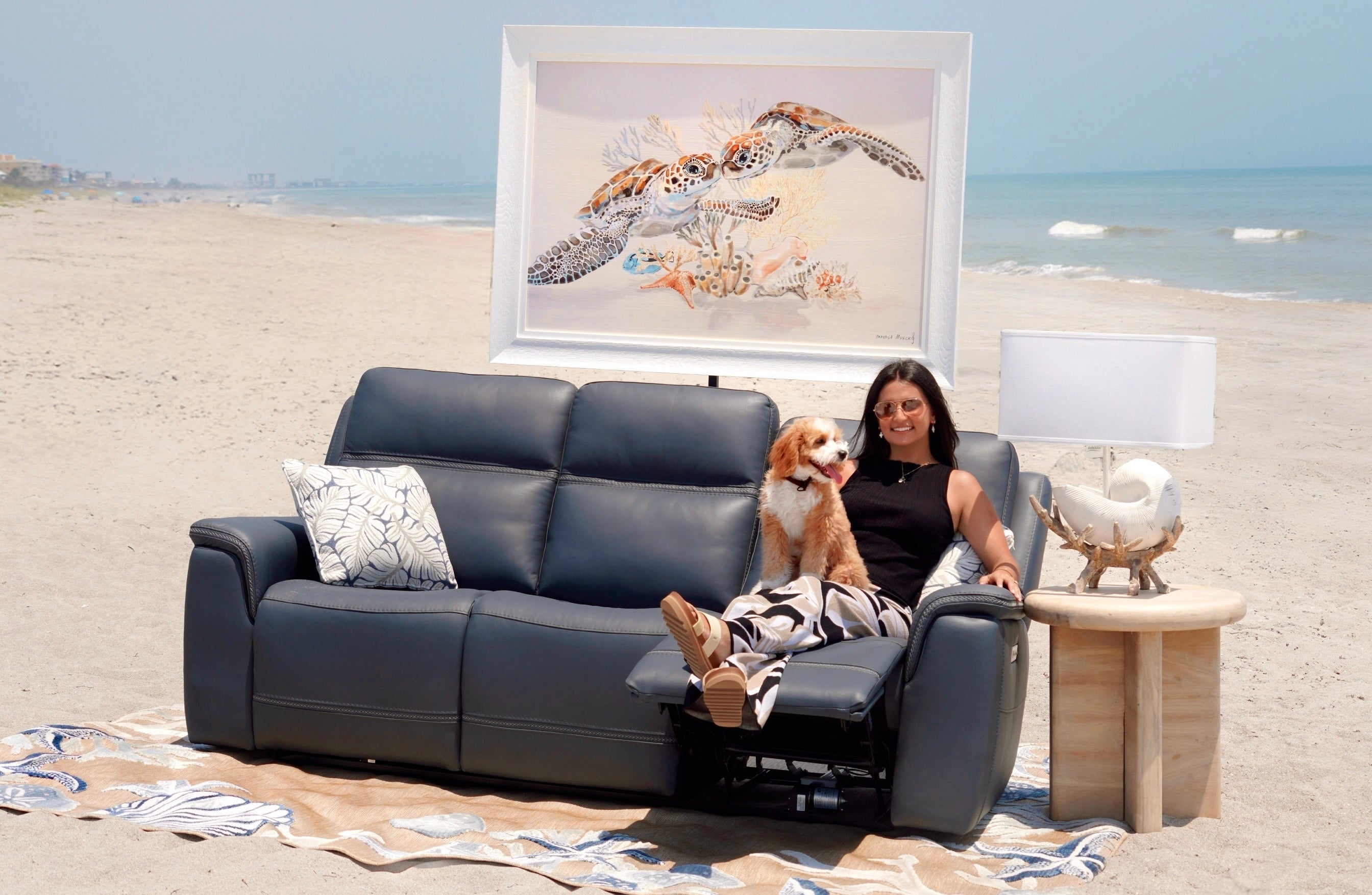 Sofa on the beach during Atlantic Fine Furniture's anniversary shoot