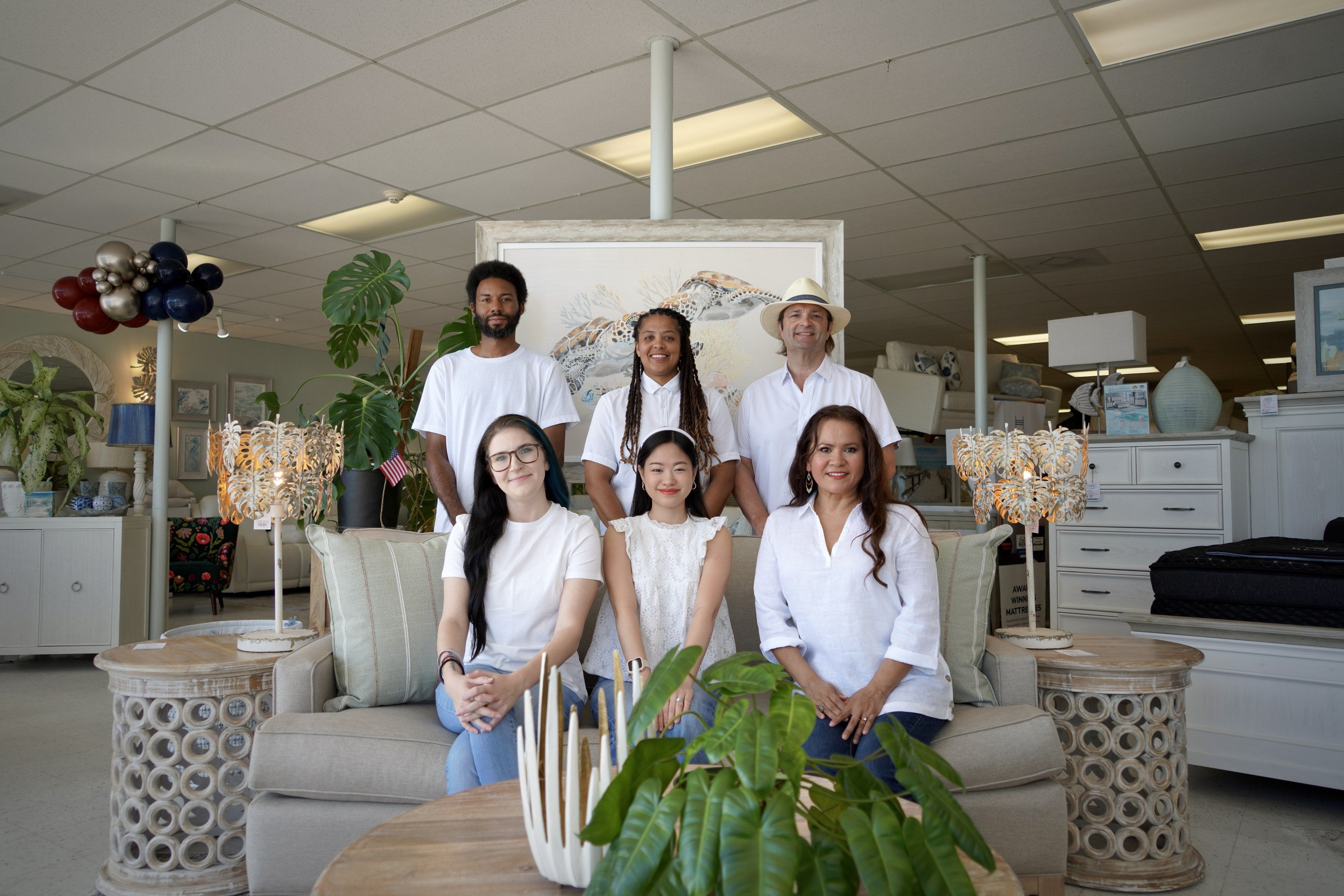 The Atlantic Fine Furnitures team in our Melbourne, Florida showroom.