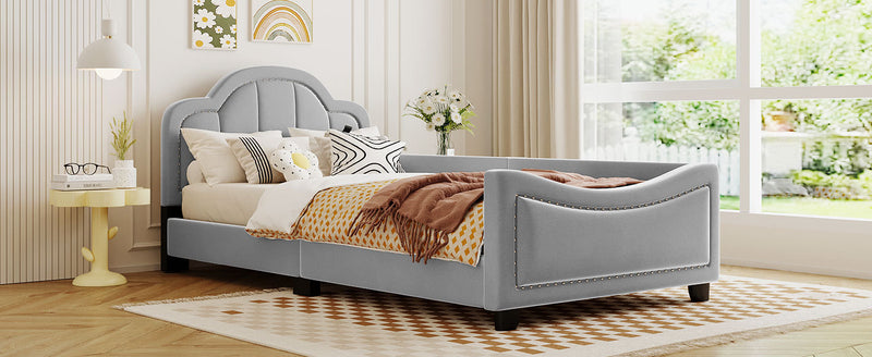 Twin Size Upholstered Daybed with Cloud Shaped Headboard, Embedded Elegant Copper Nail Design, Gray