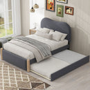 Upholstered Platform Bed With Wood Supporting Feet And Trundle