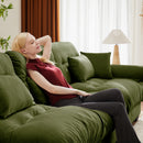 Modern Velvet Sofa With Bolstered Armrests And Pillows