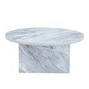 Versatile Round Coffee Table For Various Interior Styles