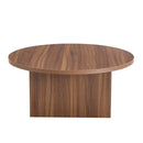 Versatile Round Coffee Table For Various Interior Styles