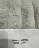 Close-up of textured fabric with 'Mondo' pattern and 'Grey' color label.