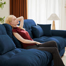 Modern Velvet Sofa With Bolstered Armrests And Pillows