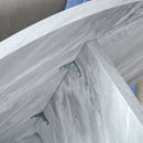 Versatile Round Coffee Table For Various Interior Styles