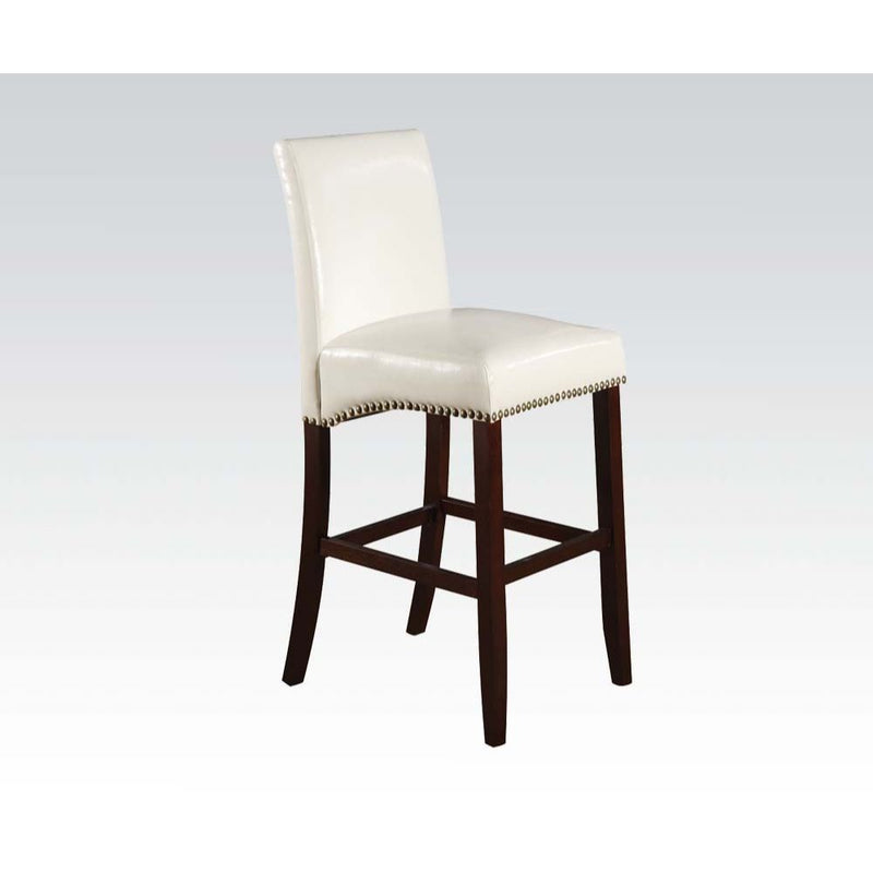 The Jakki sophisticated counter chair features crisp bycast leather and elegant nailhead trim details. The bycast leather seat and back with nailhead bottom accent trim will stand out as bold and stylish. Available in white and black.