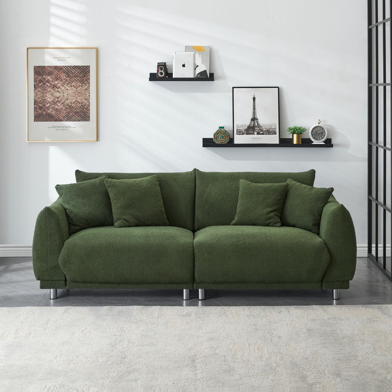 Teddy Wool Beige Sofa With Four Throw Pillows And Hardware Feet Can Sit Comfortably In An Apartment Bedroom Without Taking Up Space