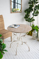 Round Wooden Table With Metal Scrollwork Legs - White Washed
