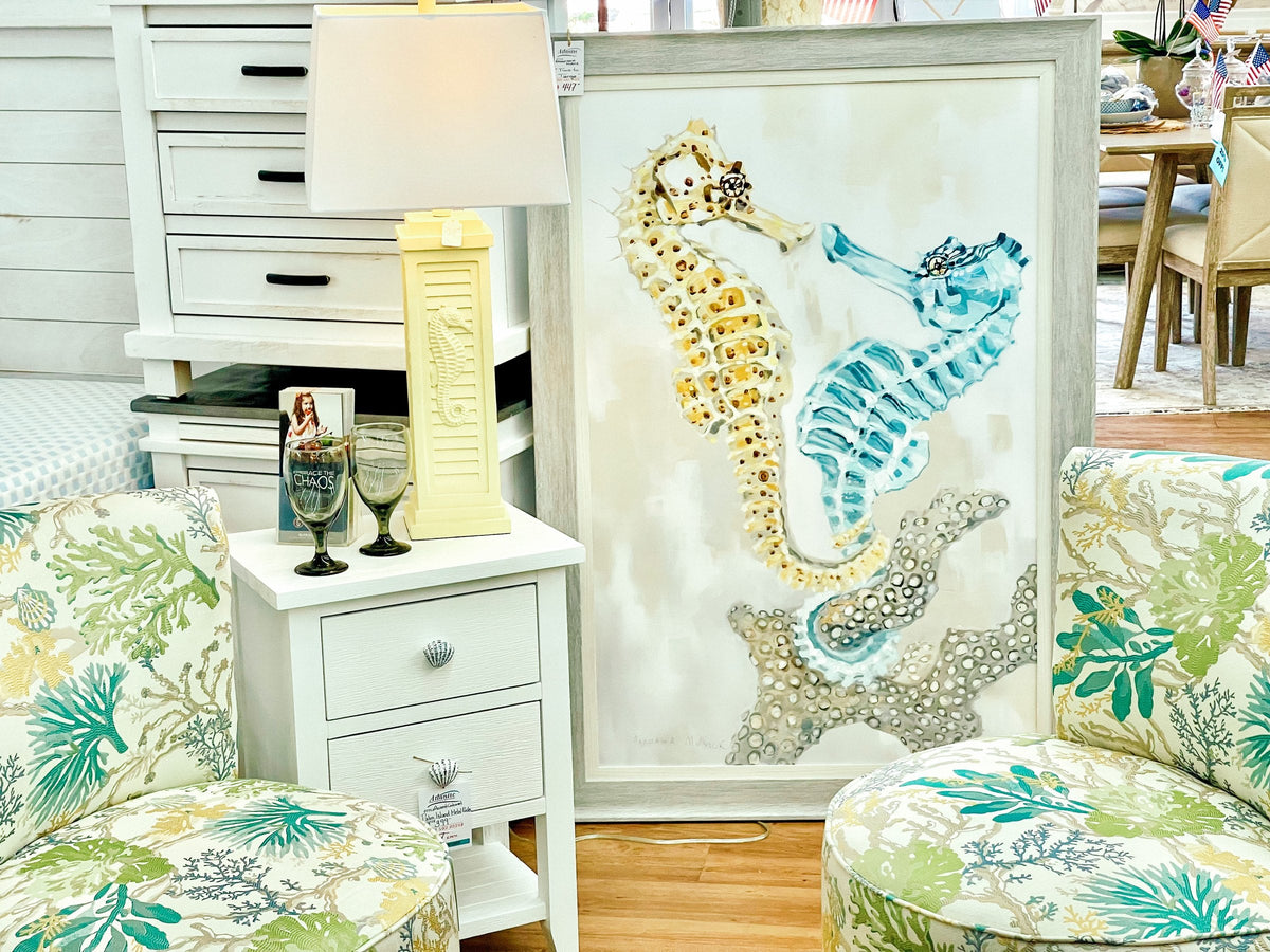 Anastasia Musick framed seahorse print on the Atlantic Fine Furniture showroom floor, Melbourne FL