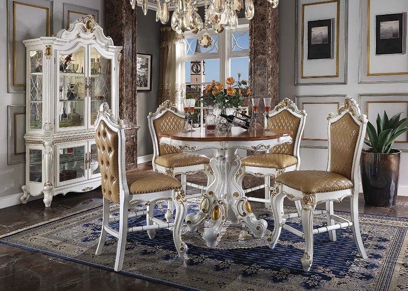 Part of Acme’s exclusive Picardy collection, this impressive counter height dining set features a round pedestal table with spectacular antique hand-brushed accents over an elegant antique finish.