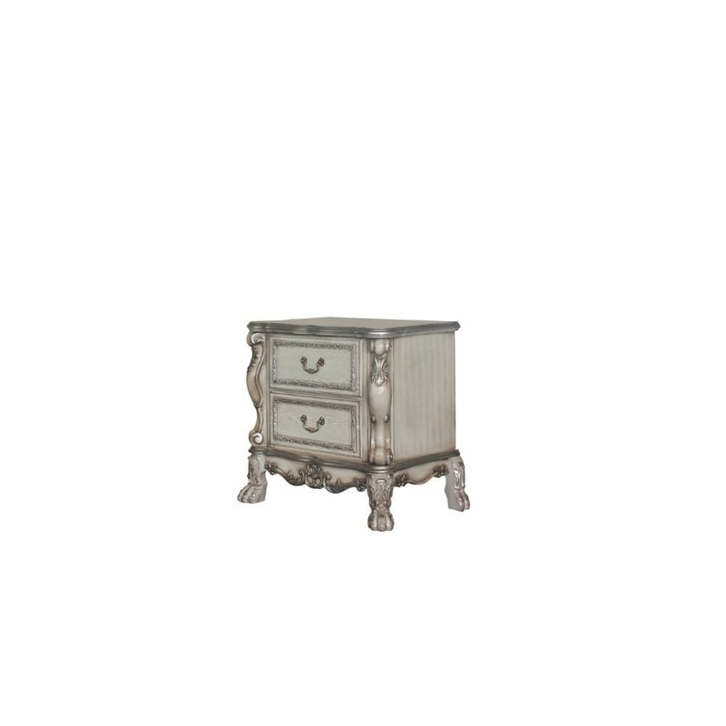 The Dresden Nightstand offers beautiful craftsmanship and artistic carvings. It features solid hardwood with two drawers for storage with coordinating carvings. The drawers feature dove tail construction and are decorated with antique brass hardware.