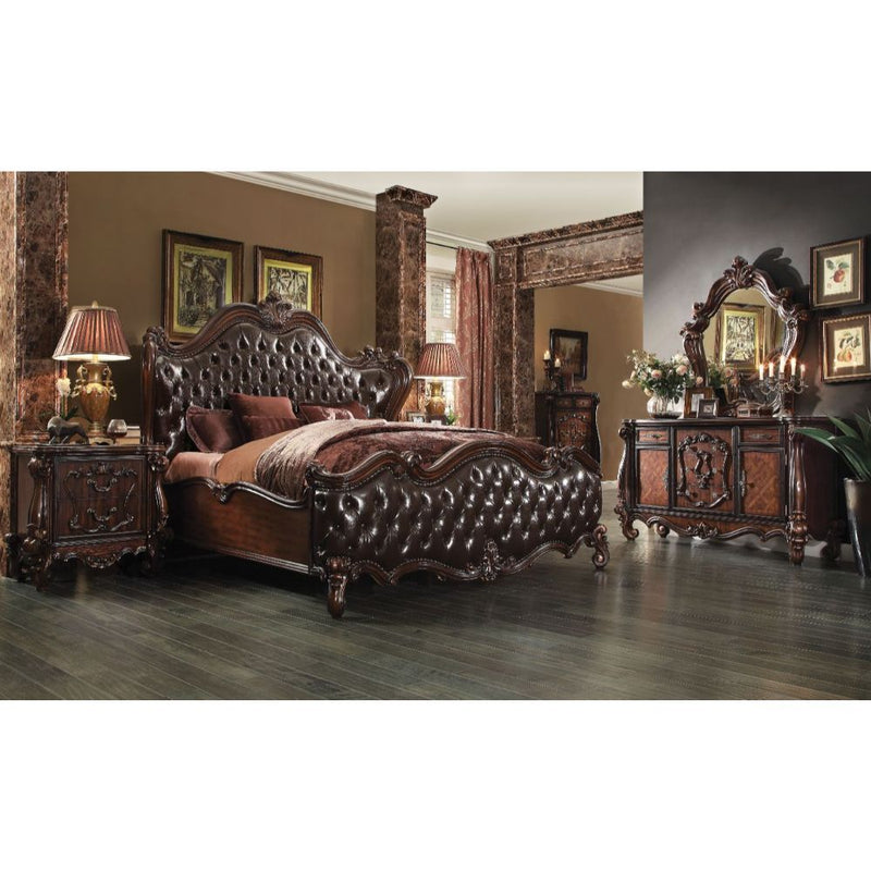 Sleep like royalty with this Versailles Bed Set. The bedroom set was inspired by old European design. The bed features carved scrollwork accent with nailhead trim Decor and tufted upholstery on both headboard and footboard.