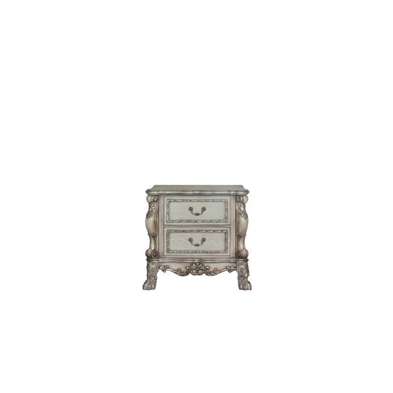 The Dresden Nightstand offers beautiful craftsmanship and artistic carvings. It features solid hardwood with two drawers for storage with coordinating carvings. The drawers feature dove tail construction and are decorated with antique brass hardware.